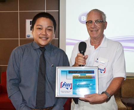 MC Richard Silverberg presents the PCEC’s Certificate of Appreciation to Dr. Ping.