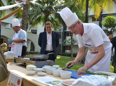 Amari Pattaya GM Brendan Daly gets to work cooking an egg and vegetable fried rice dish.