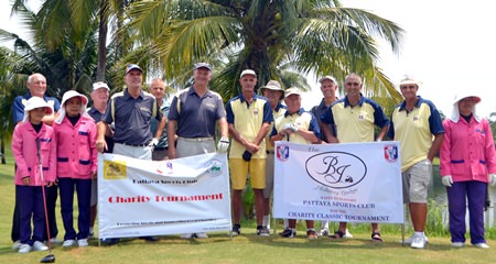 Tournament organizers, players and caddies pose for a group photo at Burapha Golf Resort.