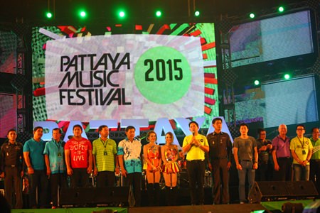 Mayor Itthiphol Kunplome, Rewat Phonlookin, Toranin Kiathichai and honored officials and guests take to the stage to officially open the 14th annual Pattaya Music Festival.