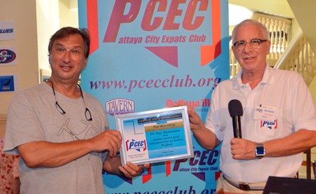Master of Ceremonies Richard Silverberg presents the PCEC’s Certificate of Appreciation to Paul Rosenberg for his interesting talk and demonstration of remote-control aircraft.