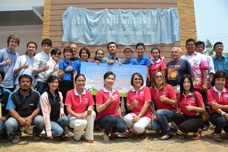 School officials and honored guests open the new classrooms for preschool students funded in part by Procter & Gamble Foundation, Jesters Care For Kids, Metha Siri Construction, and the YWCA Bangkok-Pattaya Center.