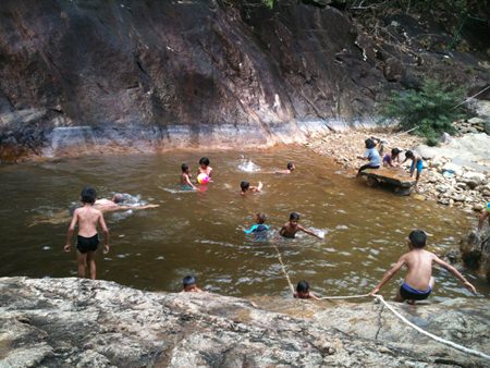 After a twenty minute trek to the Klong Plu Waterfall, the cold pool at the top was very welcoming for everyone.