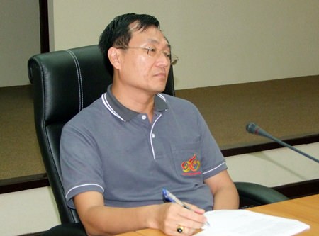 Chonburi Deputy Mayor Chamnanwit Taerat leads a meeting to plan how Chonburi will mark Monday’s Visakha Bucha holiday.