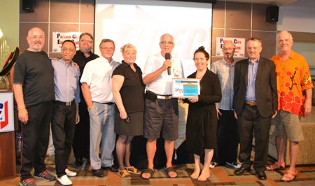 Master of Ceremonies Richard Silverberg presents Mara Swankey and Pattaya Players with the PCEC’s Certificate of Appreciation for an informative and entertaining presentation.
