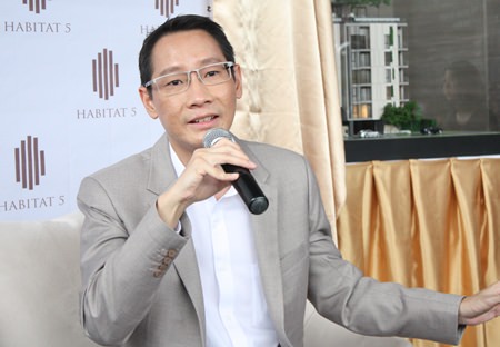 Chanin Vanijwongse, CEO of Habitat Five Co. Ltd., addresses the media at a press conference held Friday, July 17 to announce the new X2 Vibe Pattaya Seasphere condominium development.