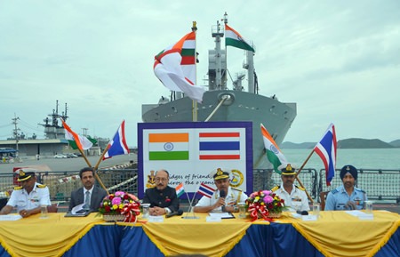 Visiting Indian naval officers and the Indian Ambassador to Thailand hold a press conference off the bow of the INS Satpura.