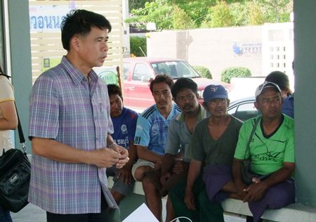 Songkran Saengjan from the Chonburi Provincial Fisheries Office meets with local fishermen to explain how to comply with Thailand’s tightened trawler regulations.