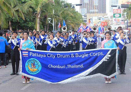 The Pattaya Drum and Bugle Corps plays the national anthem.