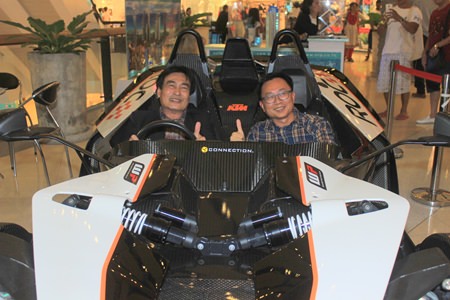 Deputy Mayor Ronakit Ekasingh (left) and PBTA president Sinchai Wattanasartsathorn sit inside the new KTM X-Bow ROC, the only one in Asia and one of only eight in the world.