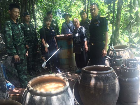 Government and military authorities raided three Huay Yai locations and seized 2,280 liters of illegal liquor, 70 percent alcohol by volume and scheduled to be used in herbal-spiced drinks.