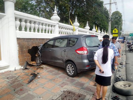 After careening off a pickup truck in an accident that killed a monk, the Suzuki Ertlga G-X driven by Apaporn Boonyaem crashed into the Jittapawan College wall.