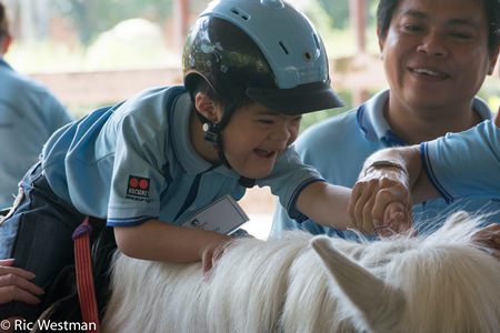 A horse’s movement is therapeutic and improves the child’s balance, co-ordination, behavior and muscle tone, along with confidence and self-esteem.