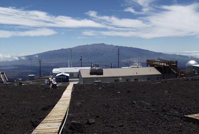 This photo provided NOAA, shows NOAA’s Mauna Loa Observatory in Hawaii. Measurements show the amount of heat-trapping carbon dioxide in the air jumped by the biggest amount on record last month, a rise amplified by El Nino, scientists say. (NOAA via AP)