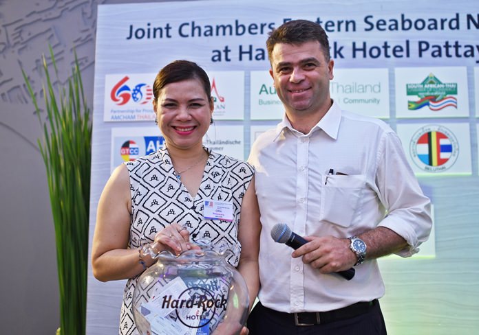(L to R) Sarudha Netsawang, membership services director at AmCham Thailand, and Vincent Pourre, corporate account manager at Wall Street English Thailand.