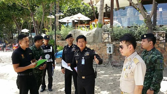 Pol. Lt. Jeerawat Sukontasap (center), head of Pattaya’s Municipal Police, leads an inspection team to Pratamnak and Wong Amat beaches.