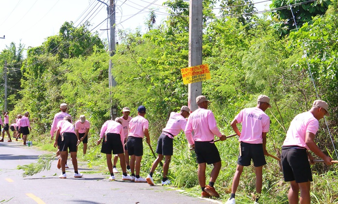 Sailors in training clean up the streets in Sattahip.