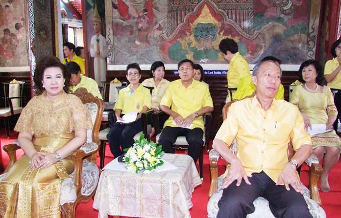 In Chonburi, Gov. Khomsan Ekachai led a ceremony in which monks chanted and the governor placed flowers before a portrait of HM the King.