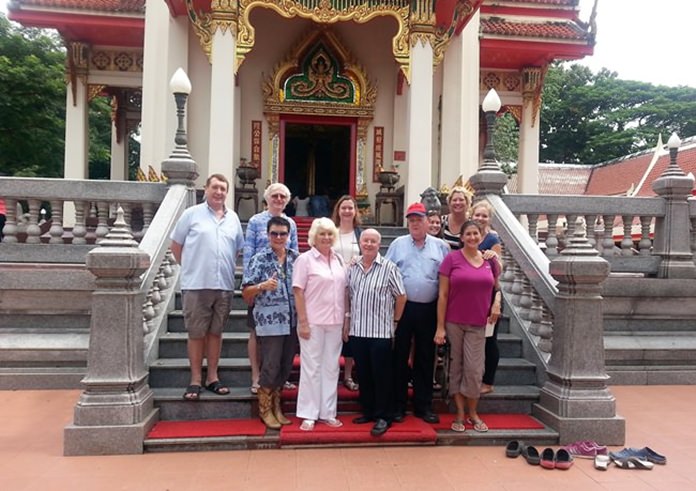 Members of Pattaya City Expat Club (PCEC) and Pattaya International Ladies Club (PILC) pose for a picture upon their arrival at City Pillar Chinese shrine in Chanthaburi during their Tastes of Thailand tour.