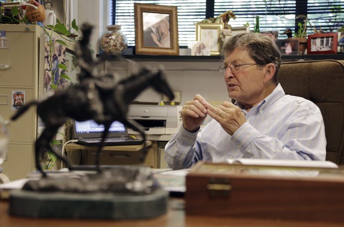 Physics professor Joe Hamilton talks about the element that he and a team has discovered during an interview in his memorabilia-filled office at Vanderbilt University Wednesday, June 8, 2016, in Nashville, Tenn. (AP Photo/Mark Humphrey)