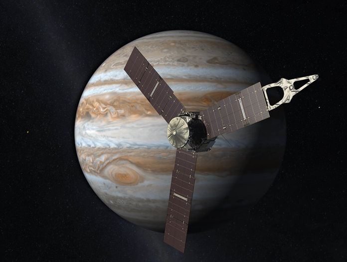 This artist’s rendering provided by NASA and JPL-Caltech shows the Juno spacecraft above the planet Jupiter. Five years after its launch from Earth, Juno entered into orbit around the gas giant on Monday, July 4, 2016. (NASA/JPL-Caltech via AP)