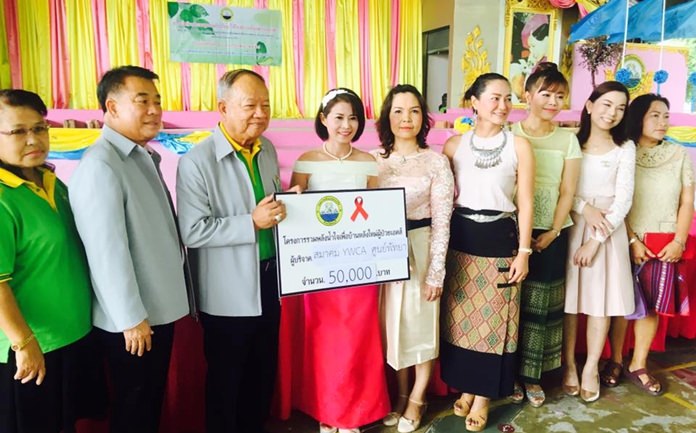 The YWCA Bangkok-Pattaya Center donated 50,000 baht July 12 to an embattled AIDS hospice to help it relocate to a friendlier community. (Photo courtesy YWCA Bangkok-Pattaya)