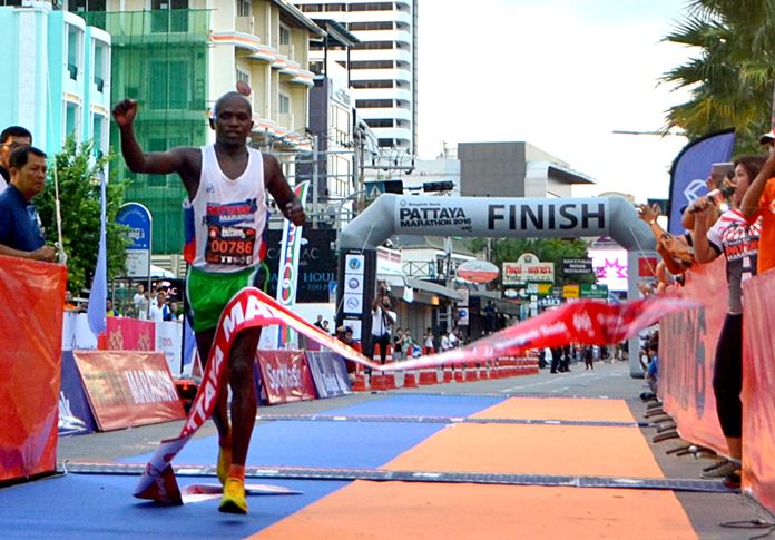 Kenya’s Noah Chepsergon crosses the finish line to win the 2016 Pattaya Marathon, Sunday, July 17.