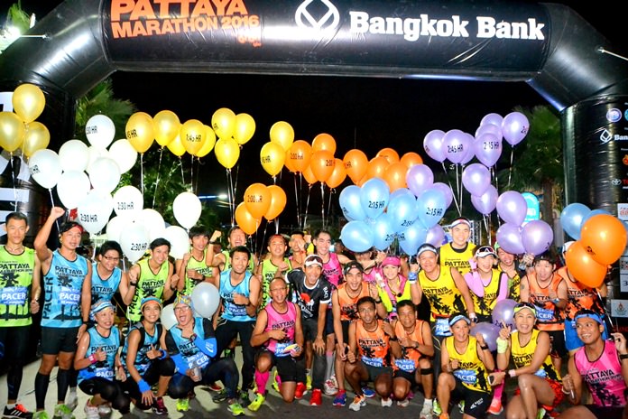Runners pose at the start line prior to the 2016 Pattaya marathon race.