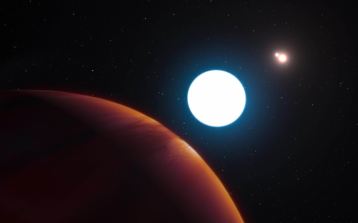 This image provided by the European Southern Observatory shows an artist’s impression of the triple star system HD 131399 from close to the gas giant planet orbiting in the system. (L. Calçada/ESO via AP)