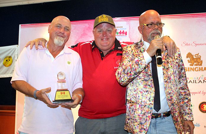 Andy Evan Memorial Best Sportsmanship Award winner Bob “Scar” Taylor (center) receives his trophy from Murray Kerr (left) and Mark Gorda (right).