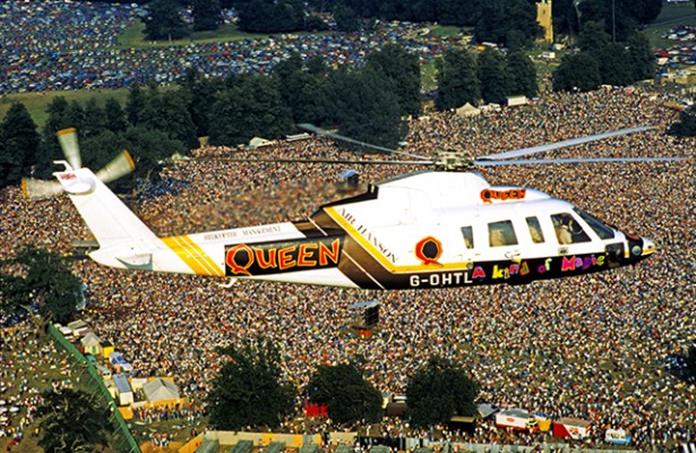Queen arrive by helicopter at Knebworth in southern England, August 9, 1986. (Image courtesy Denis O’Regan)