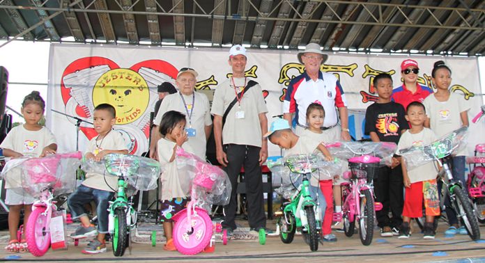 Selected students from the Fountain of Life Center are presented with a bicycle for their achievements and behaviour.