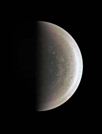 This Aug. 27, 2016 image provided by NASA provides a new perspective on Jupiter’s south pole, seen when the Juno spacecraft was about 58,700 miles (94,500 kilometers) away. Unlike the equatorial region’s familiar structure of belts and zones, the poles are mottled by clockwise and counterclockwise rotating storms of various sizes, similar to giant versions of hurricanes on Earth. (NASA/JPL-Caltech/SwRI/MSSS via AP)