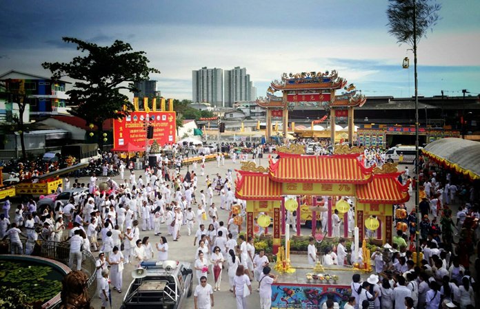 The Sawang Boriboon headquarters is bathed in white as followers arrive en masse to celebrate the beginning of this year’s Vegetarian Festival.