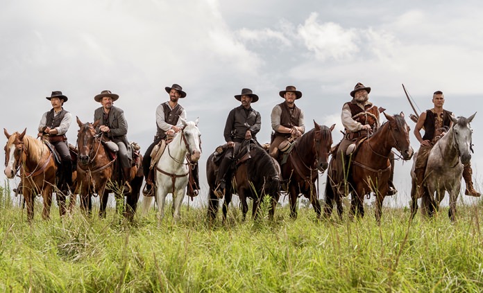 From left, Byung-hun Lee, Ethan Hawke, Manuel Garcia-Rulfo, Denzel Washington, Chris Pratt, Vincent D’Onofrio and Martin Sensmeier appear in a scene from “The Magnificent Seven.” (Sam Emerson/Sony Pictures via AP)