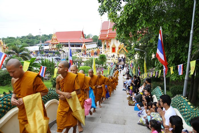 Monks in Sattahip climb the celestial stairs to prepare for the Tak Bat Devo ceremony.