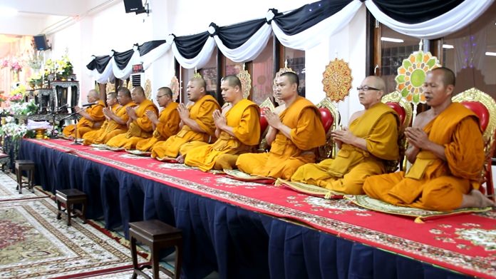 Revered monks chant holy funeral prayers at Wat Nongprue.