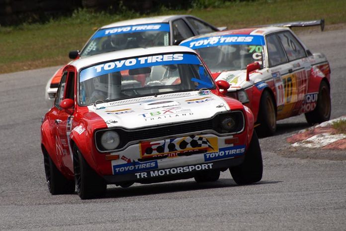 The Escort leading the way through the Bira hairpin.