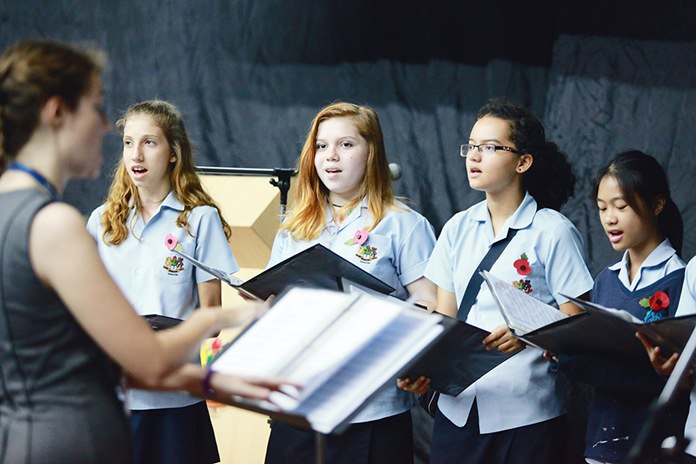 The Chamber Choir performs a version of In Flanders Fields