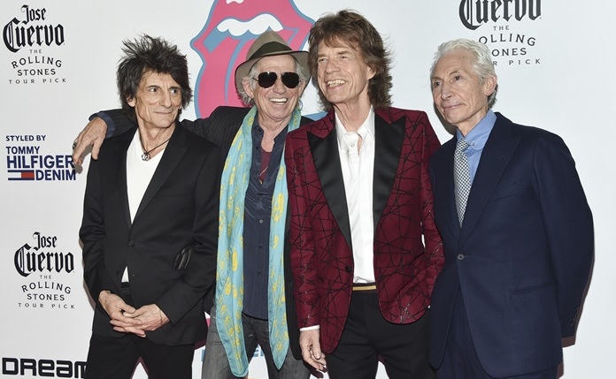 The Rolling Stones (from left) Ronnie Wood, Keith Richards, Mick Jagger and Charlie Watts attend the opening night party for “Exhibitionism” at Industria on Tuesday, Nov. 15, in New York. (Photo by Evan Agostini/Invision/AP)