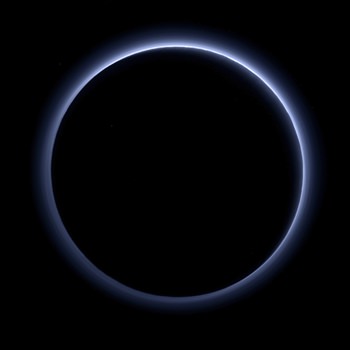 This image released by NASA on Thursday, Oct. 8, 2015 shows a haze layer surrounding Pluto, photographed by the New Horizons spacecraft. On Friday, Oct. 28, 2016, NASA said the spacecraft has sent back the last bit of data collected from its July 14, 2015 flyby. It took more than five hours for the image to reach Earth from NASA’s New Horizons spacecraft, some 3 billion miles away. (NASA/JHUAPL/SwRI via AP)