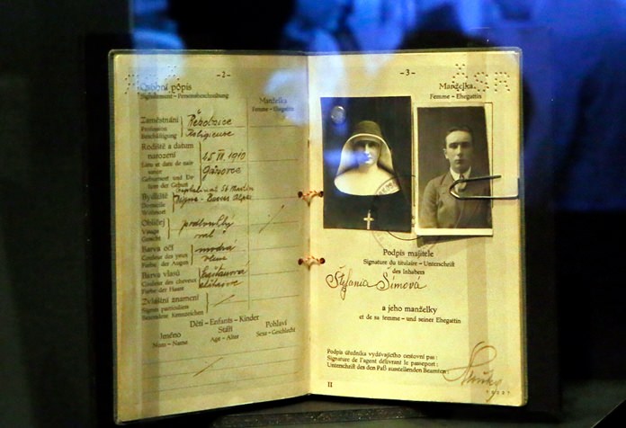 The passport of a Czech agent used to disguise as a nun is displayed as part of the ‘Secret Wars’ exhibition at Invalides Museum, in Paris, Monday, Dec. 12. (AP Photo/Francois Mori)