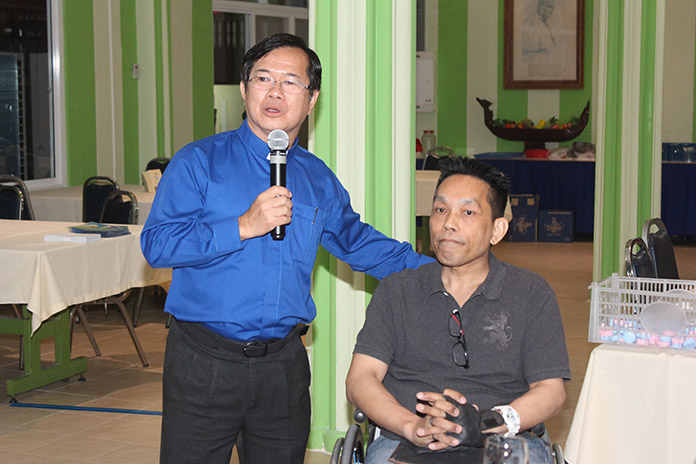 Father Michael introduces Manit Intharapim, a long time resident of the Redemptorist Center, who is now a successful programmer with his own company.
