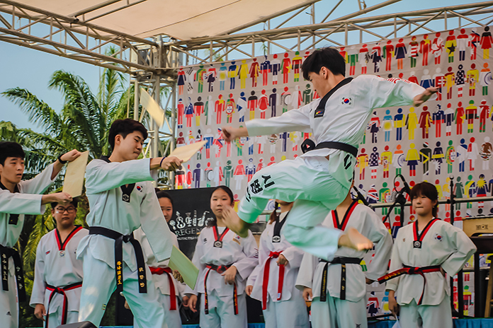 Students perform Taekwondo during the martial arts demonstration.