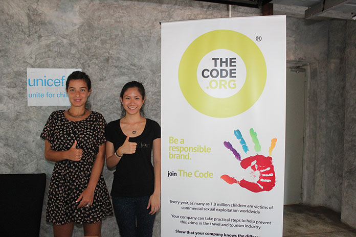 Jessica Tradati (left), program assistant with The Code.org and a freelance journalist based in Bangkok, with Orasa Thurasukarn (right), Program Assistant of The Code.org give the seminar a thumbs up.