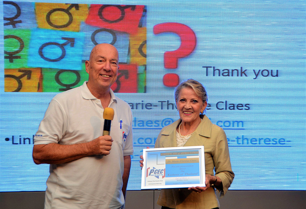 MC Roy Albiston presents the PCEC's Certificate of Appreciation to Dr. Claes for her informative talk about transgender diversity in Thailand.