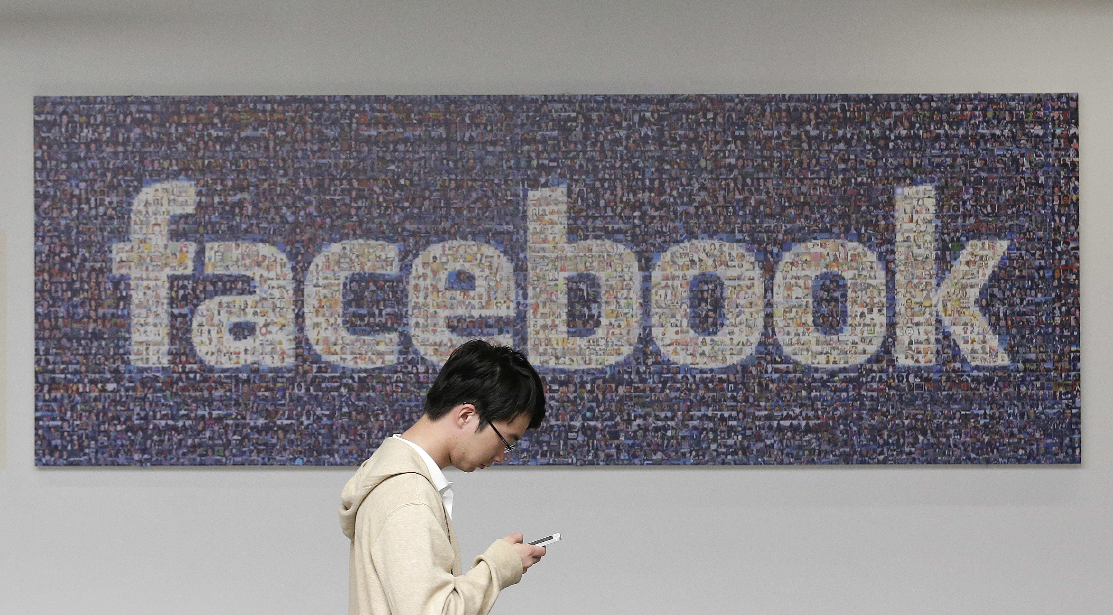 Facebook announced Thursday, April 6, 2017, it is launching a tool to help users spot false news articles on the site. (AP Photo/Jeff Chiu, File)