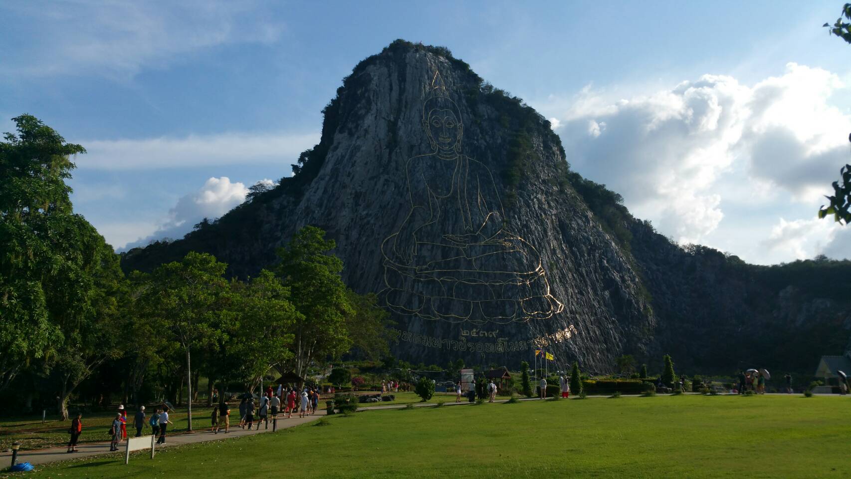 Not every tourist came to Pattaya armed with a water gun for Songkran. Some went to Khao Chee Chan, where a large image of Lord Buddha is carved into the side of the mountain.