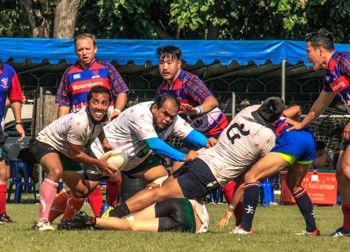 Pattaya Panthers attempt to move the ball against Hong Kong Scottish on day 2 of the Chris Kays Memorial 10’s Rugby Tournament at Horseshoe Point in Pattaya, Sunday, April 30. (Photo/Harpic Bryant)