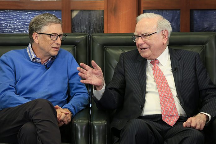 Berkshire Hathaway Chairman and CEO Warren Buffett, right, speaks to Microsoft co-founder and director at Berkshire Hathaway, Bill Gates. Numerous media stories and even famous billionaires are glamorizing dropouts or encouraging kids to skip college entirely. Statistically speaking, they are not the norm. (AP Photo/Nati Harnik)